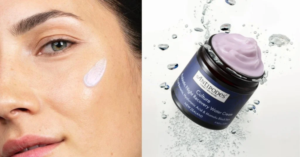 Probiotic Cosmetics: 7 Proven Benefits for a Superior Skin Microbiome 6 Close-up of a woman applying probiotic skincare cream and a jar of Antipodes Culture Night Recovery Water Cream with water splashes.